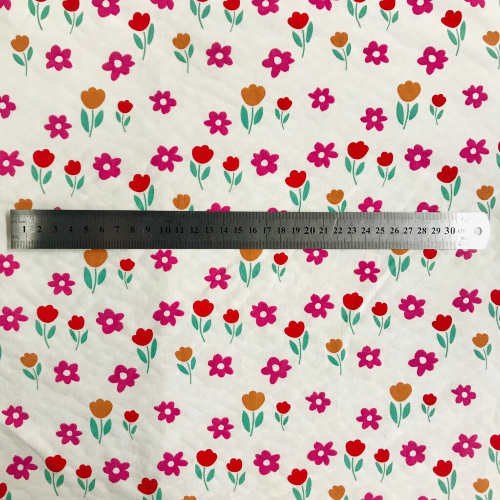 Tissu Jersey Coton Fleuri Uv Magique — vue 3